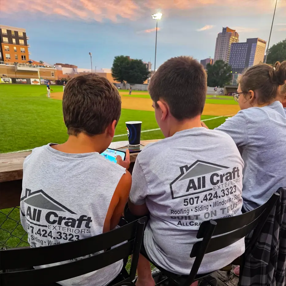 Children wearing All Craft Exteriors Jerseys