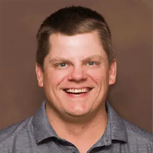 Portrait of Corey, gutter expert at All Craft Exteriors in Rochester, Minnesota. .