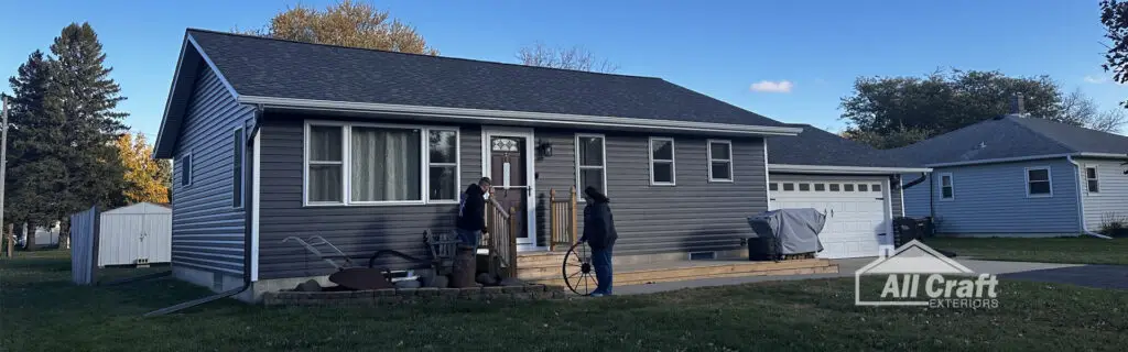 Finished Osland home in Grand Meadow, Minnesota, renovated by All Craft Exteriors with new siding, windows, and gutters.
