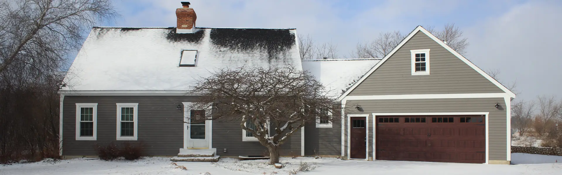 Minnesota home exterior illustrating roofing company stability and local reliability.
