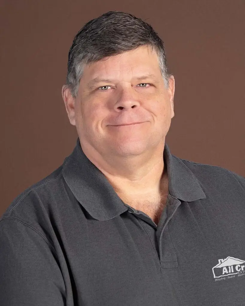 Portrait of Alex Ball, Marketing Director at All Craft Exteriors, a home improvement company based in Rochester, Minnesota.